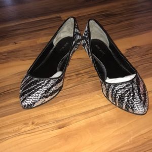 Black and silver flats
